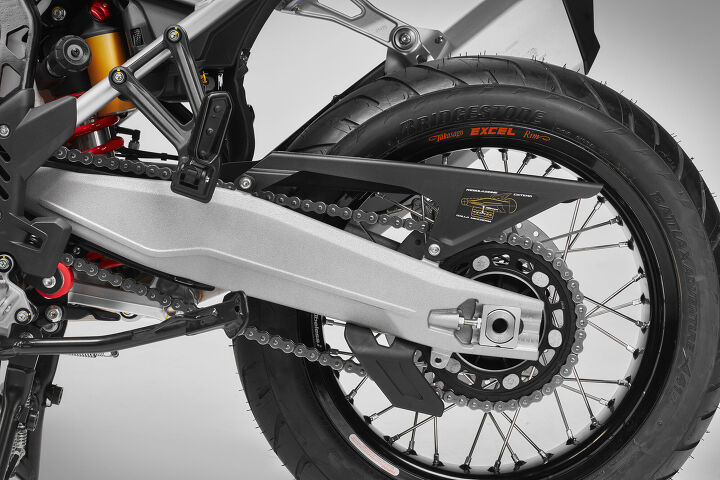 2024 mv agusta enduro veloce first look, An aluminum alloy swingarm cradles a Takasago Excel tubeless spoke wheel wearing the standard Bridgestone Battlax A41 tire Note also the preload knob
