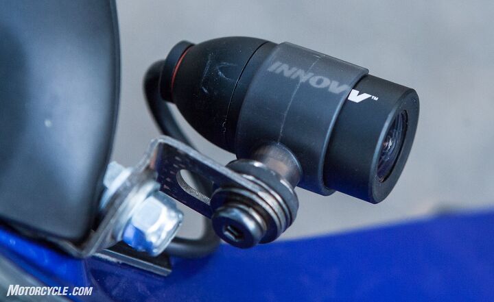mo tested innovv c5 motorcycle camera system review, The 1920 x 1080p chip lives inside this sleek easy to mount aluminum case The mount is attached to the bolt securing the left mirror