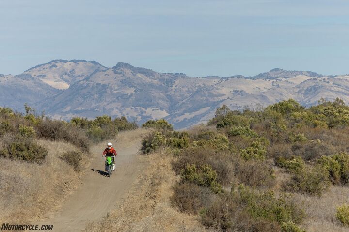  Californication: The KLX230R/R S is a green sticker bike, meaning Californians can ride it all year round. A keyed ignition system and gas cap now come standard - previously, it was only available on CA-spec models.