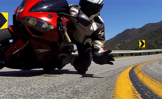 Weekend Awesome - Rider Picks Up GoPro Camera Mid-Corner